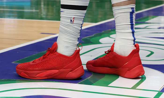 View of Luka Doncic's red Jordan shoes.